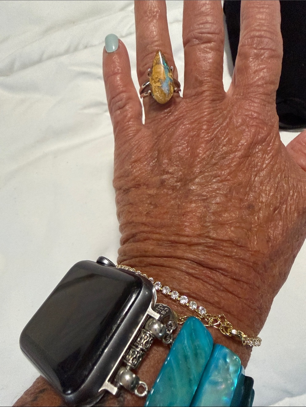 Boulder opal, teardrop design set in sterling silver